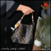 شنطة لويس فيتون بني داكن منقوش بشعار LV