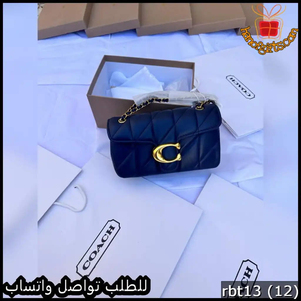 شنطة كوتش لون كحلي بتفاصيل ذهبية