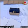 شنطة كوتش لون كحلي بتفاصيل ذهبية