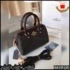 شنطة كوتش بلون كوفي و عنّابي بتصميم كلاسيكي