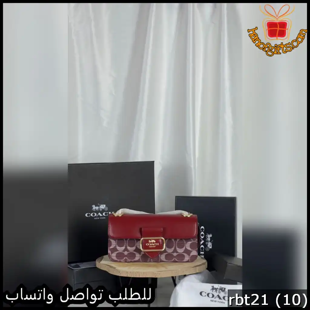 شنطة كوتش نسائية بلون عنابي مع نقشة الماركة