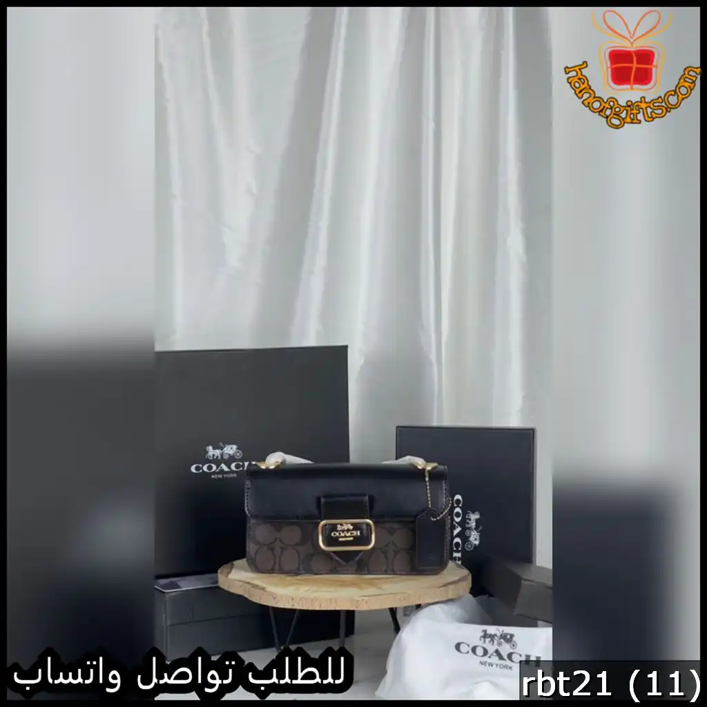 شنطة كوتش لون أسود بنقشة الماركة البنية 3 شنطة كوتش لون أسود بنقشة الماركة البنية