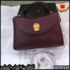 شنط اقنر عنابي غامق بملحقات الماركة