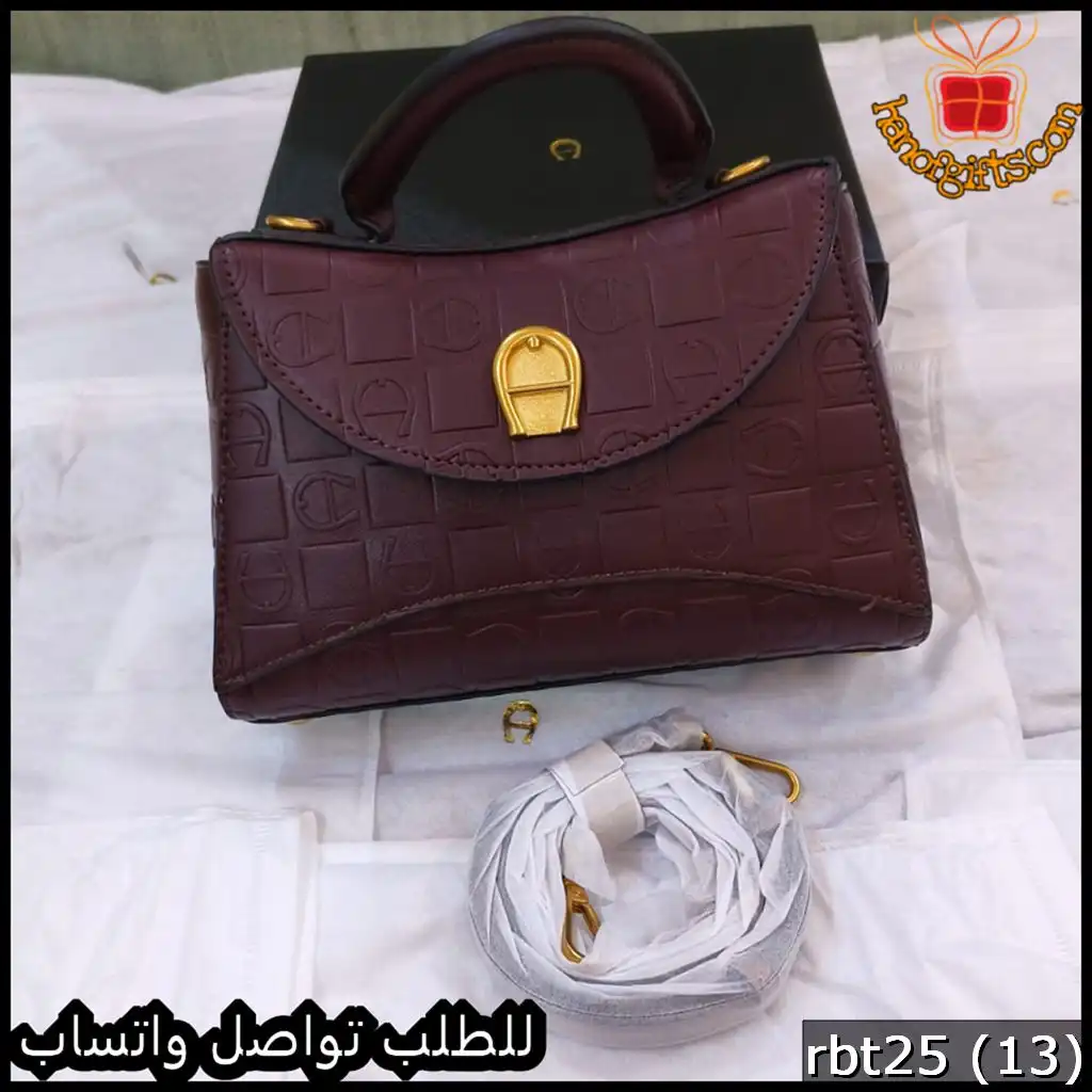 شنط اقنر عنابي غامق بملحقات الماركة