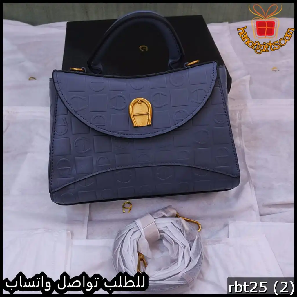 شنطة اقنر سماوي غامق بملحقات الماركة