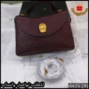 شنط اقنر عنابي غامق بملحقات الماركة