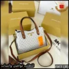شنطة مايكل كورس أبيض بنقش MK مع أطراف جلدية بنية