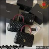شنطة شانيل سوداء بمقبض عنابي أنيق