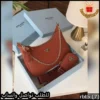 شنطة برادا لون جملي