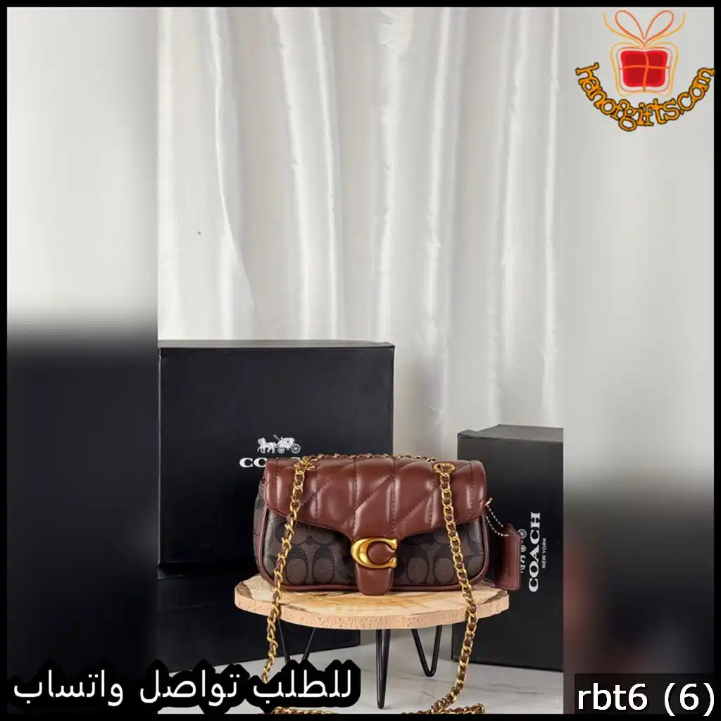 شنطة كوتش جلد عنابي حجم وسط