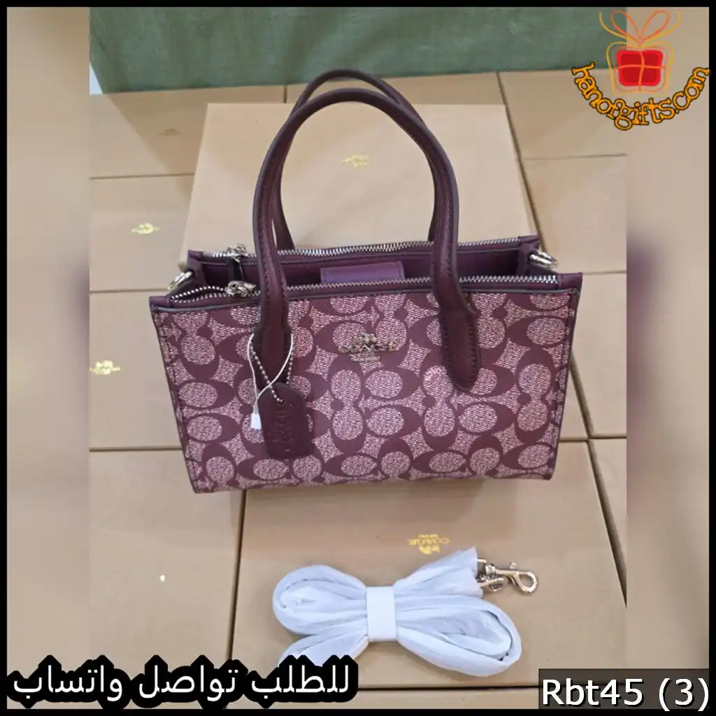 شنطة كوتش بتصميم المونوغرام العنابي