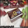 شنطة قوتشي بني ماهوجني لامع