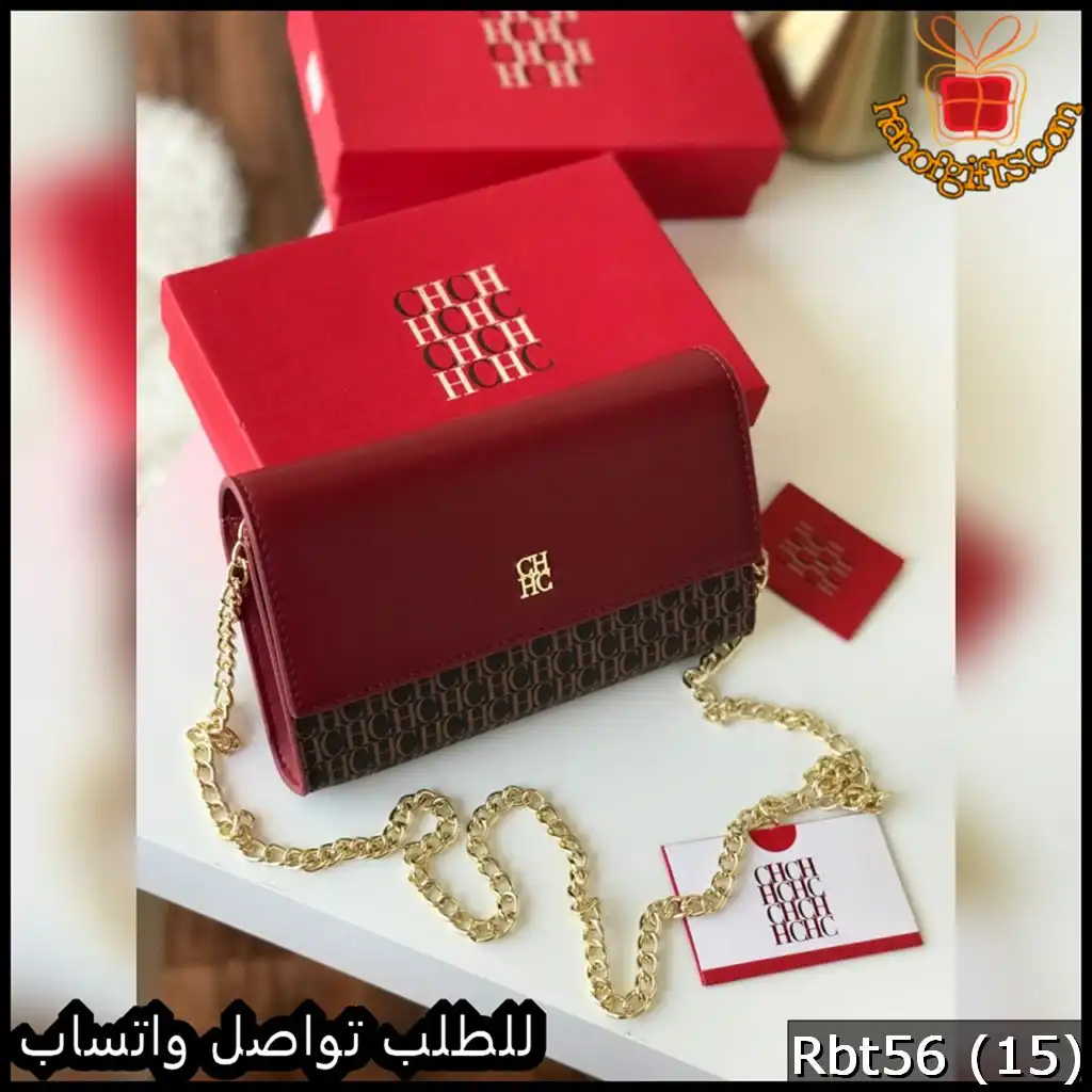 شنطة كارولينا هيريرا عنابي مع بني