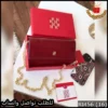 شنطة كارولينا هيريرا احمر لامع