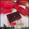 شنطة كارولينا هيريرا عنابي مع بني