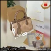 شنطة Coach البيج المزخرفة