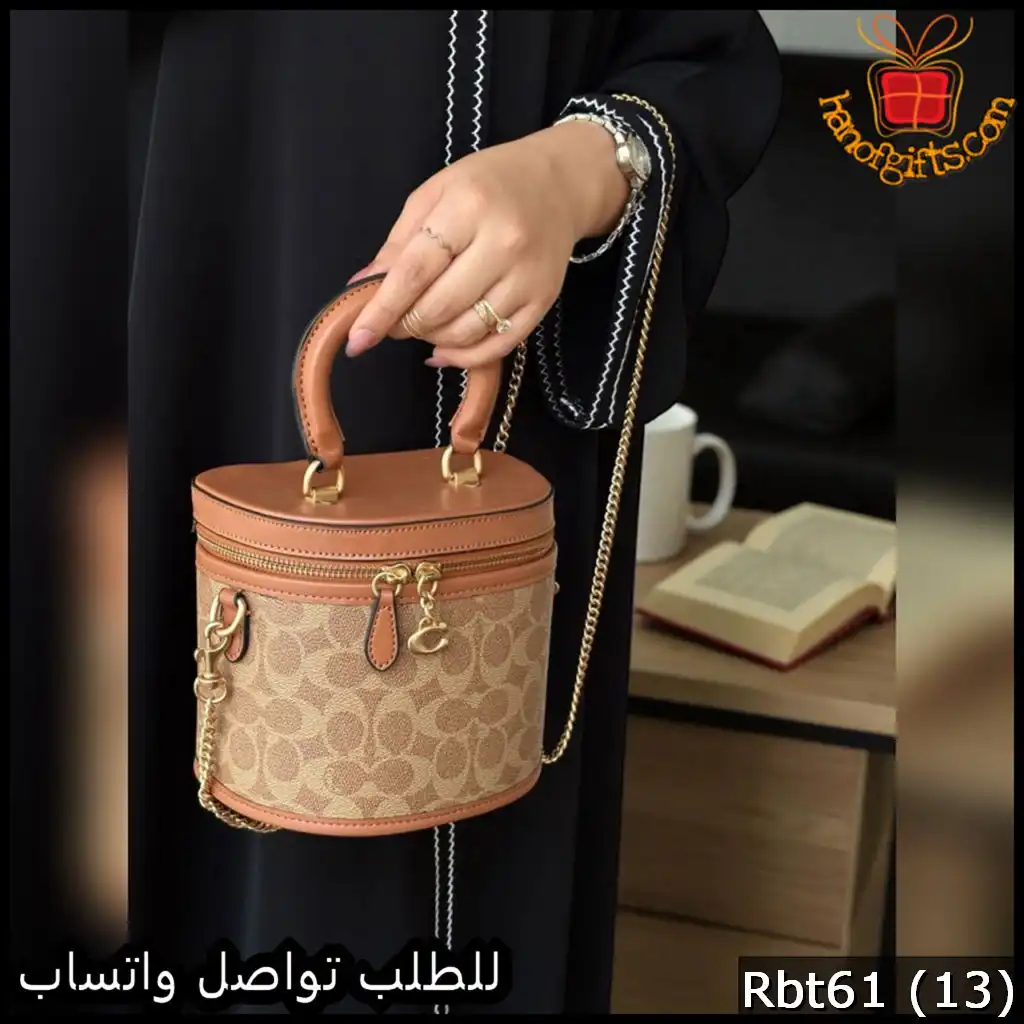 شنطة Coach دائرية بني فاتح