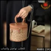 شنطة Coach دائرية بني فاتح