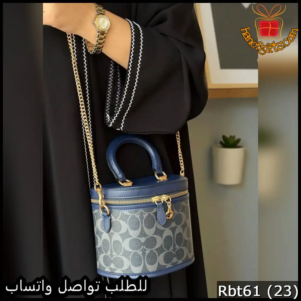 شنطة يد Coach نسائية دائرية كحلية