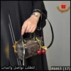 شنطة Coach البنية الصغيرة مع كرز