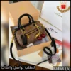 شنطة Coach بني فاتح مع كرز