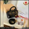 شنطة يد Coach نسائية صغيرة سوداء مع كرز