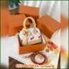 شنطة Louis Vuitton Alma BB بنقشة الكرز