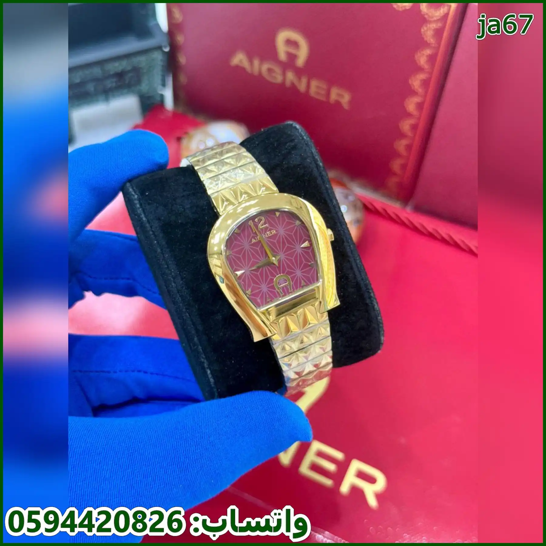 ساعة AIGNER نسائية ذهبي و عنابي