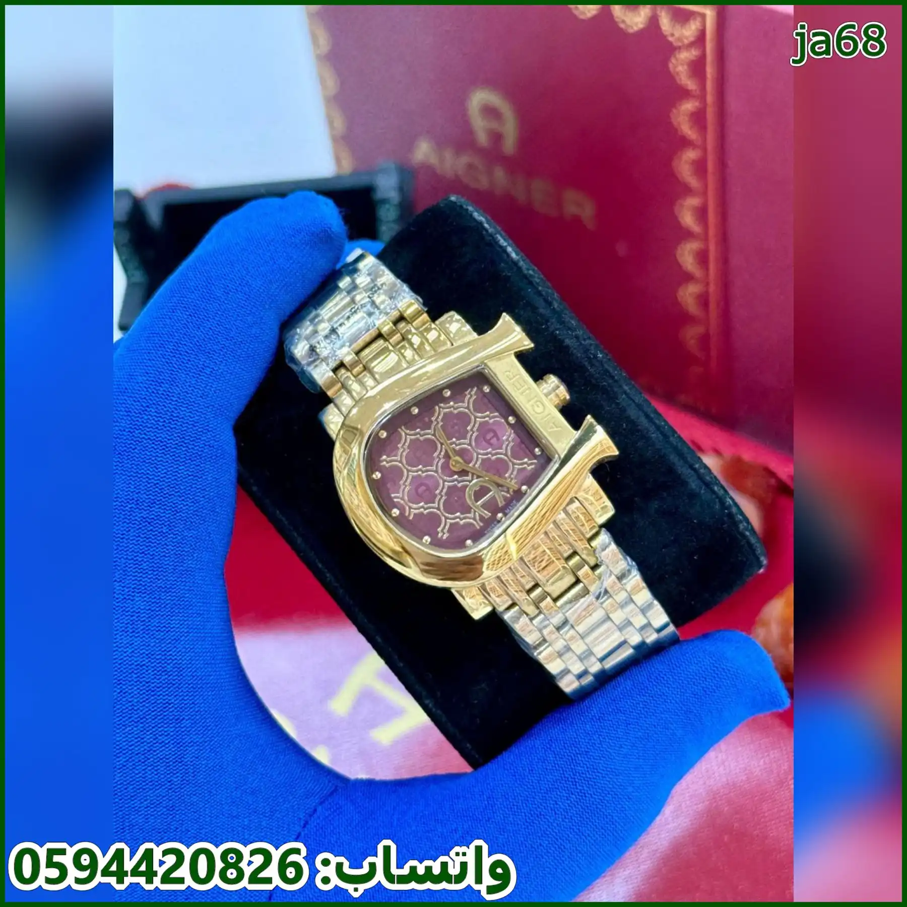 ساعة اقنر نسائي ذهبي ومينا عنابي