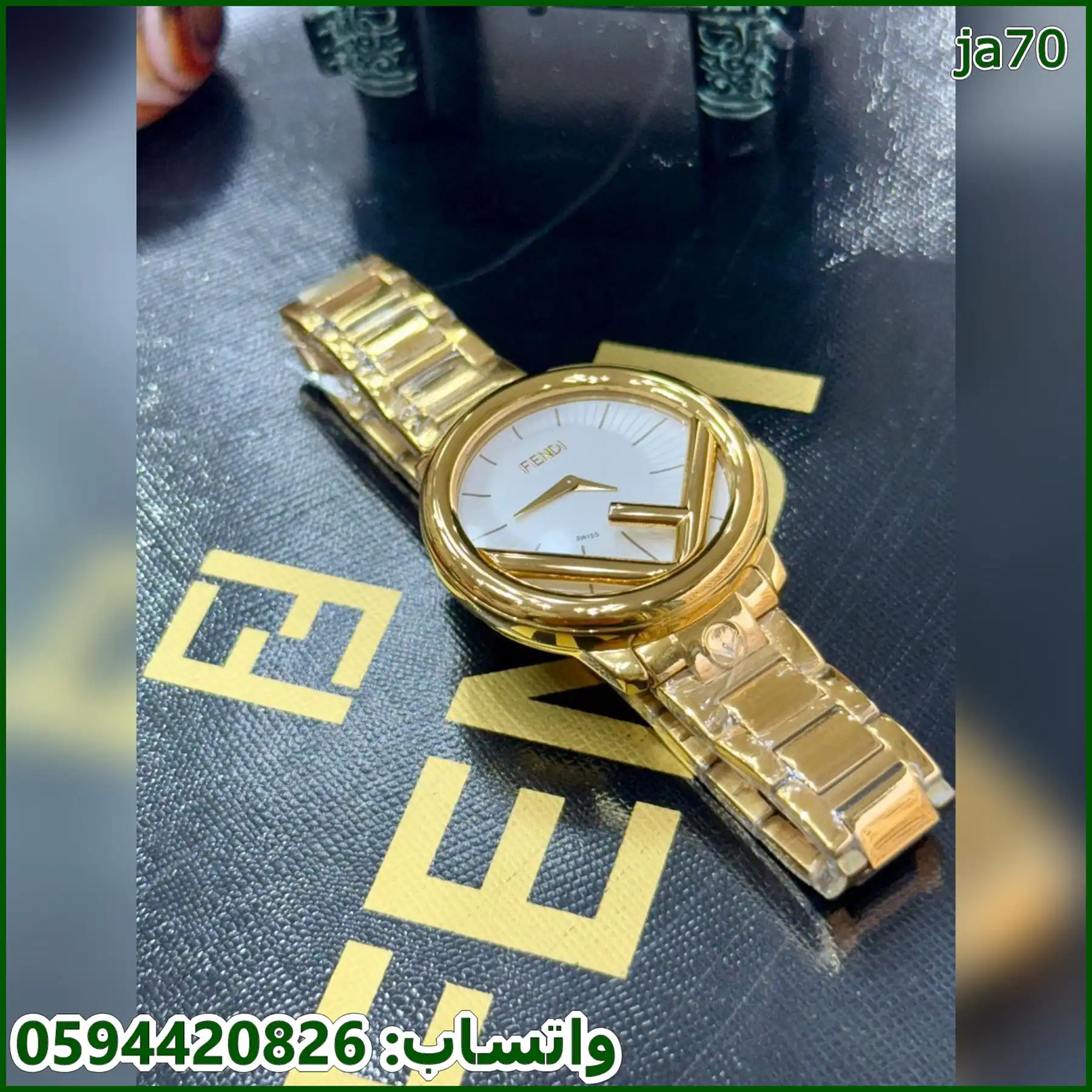 ساعه فندي دائرية نسائي 36 ذهبي وابيض