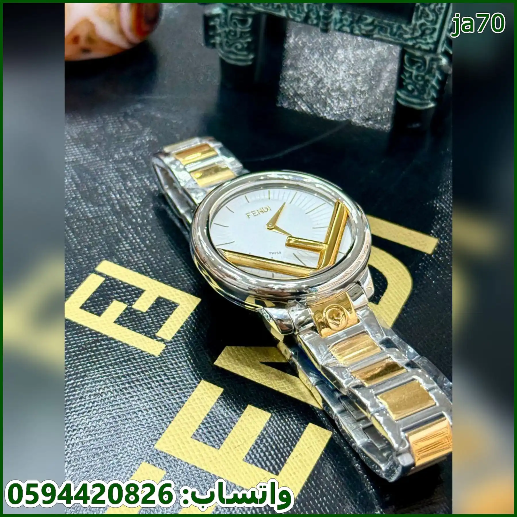 ساعه فندي دائرية نسائي 36 مكس وابيض