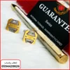 قلم وكبك Gucci فضي بتفاصيل ذهبي