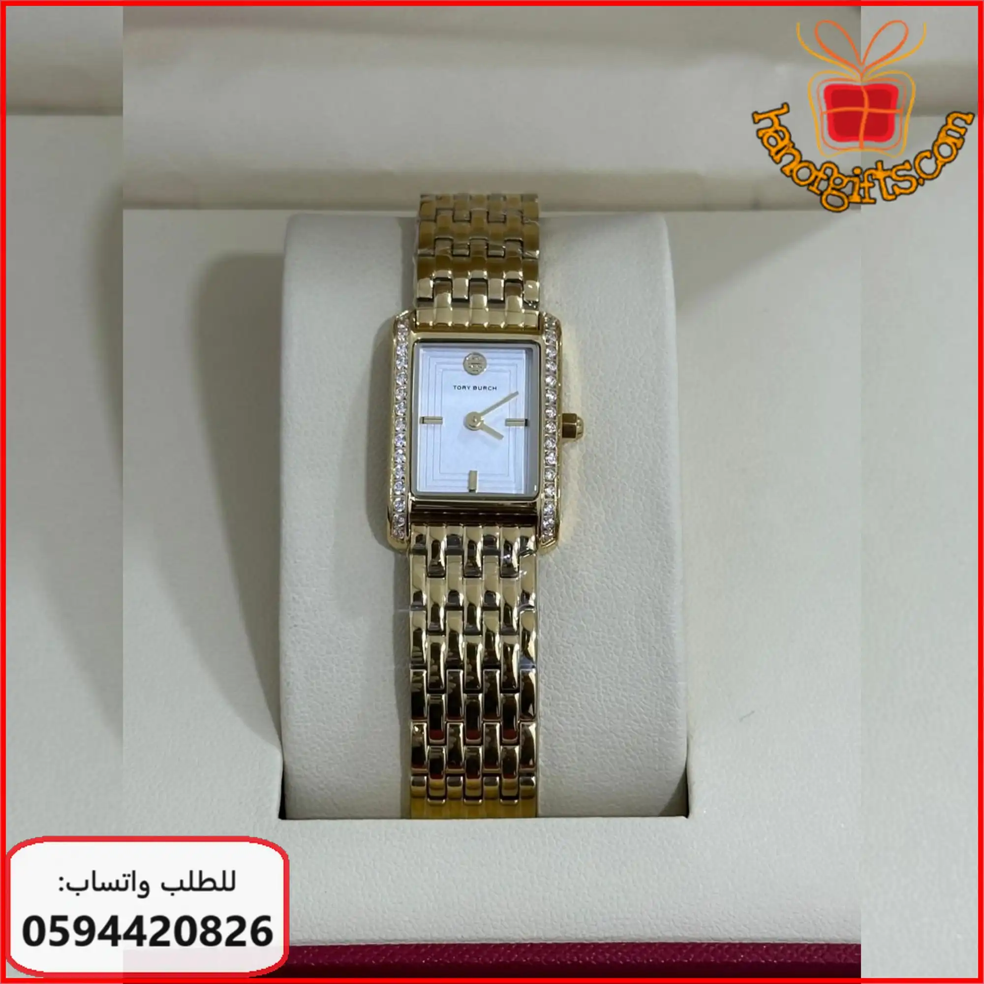 ساعات Tory Burch ذهبي وابيض واطار فصوص