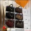 شنطة Aigner باللون البني