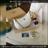 شنطة Coach Tabby مع ميدالية (أسود أبيض وردي جملي عنابي)