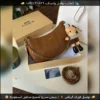 شنطة Coach Tabby مع ميدالية (أسود أبيض وردي جملي عنابي)