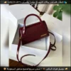 شنطة Jacquemus عنابي لامع