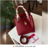 شنطة سي اتش مونوغرام نسائية عنابي