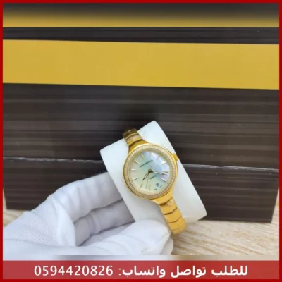 ساعة إمبوريو أرماني نسائية ذهبية بتصميم فاخر وميناء لؤلؤي ساعة إمبوريو أرماني نسائية ذهبية بمينا ابيض